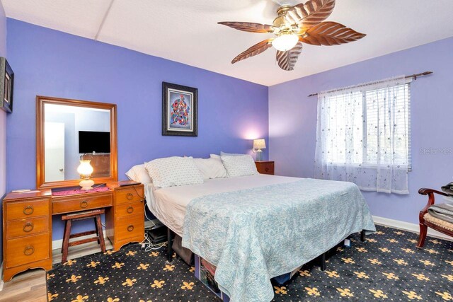 11201 122nd Ave Unit 167, Largo, FL 33778 - bedroom featuring ceiling fan