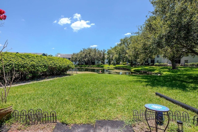 11201 122nd Ave Unit 167, Largo, FL 33778 - view of green lawn with a water view