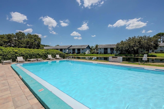 11201 122nd Ave Unit 167, Largo, FL 33778 - community pool with a residential view and a patio