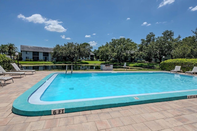 11201 122nd Ave Unit 167, Largo, FL 33778 - community pool with a patio area and a water view