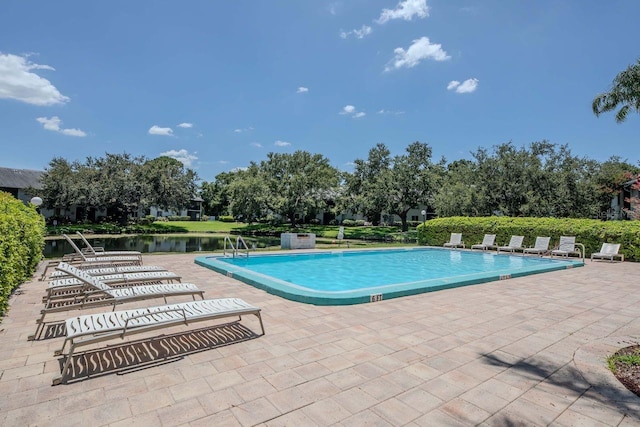 11201 122nd Ave Unit 167, Largo, FL 33778 - community pool with a patio area and a water view