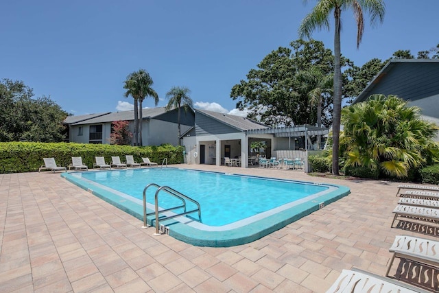 11201 122nd Ave Unit 167, Largo, FL 33778 - community pool with a pergola and a patio