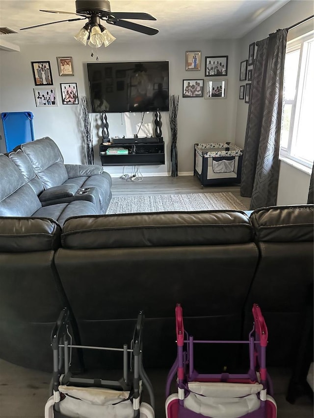 2198 Academy Dr, Clearwater, FL 33764 - living area featuring ceiling fan and wood finished floors