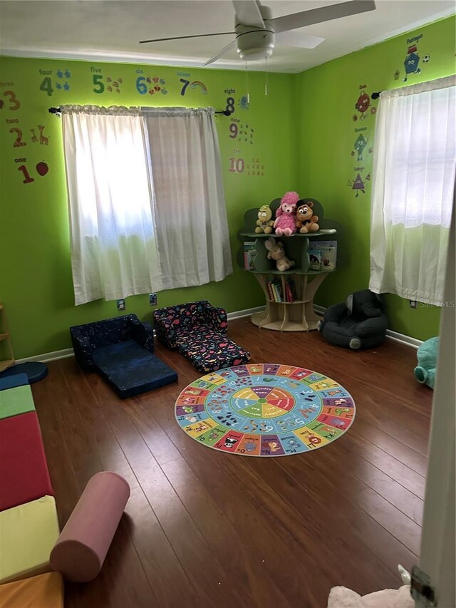 2198 Academy Dr, Clearwater, FL 33764 - playroom featuring healthy amount of natural light, hardwood / wood-style floors, and a ceiling fan
