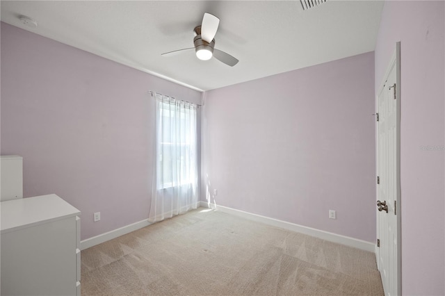 17668 Bright Wheat Dr, Lithia, FL 33547 - spare room with ceiling fan, light colored carpet, baseboards, and a smoke detector