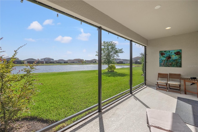 17668 Bright Wheat Dr, Lithia, FL 33547 - sunroom with a water view and a residential view