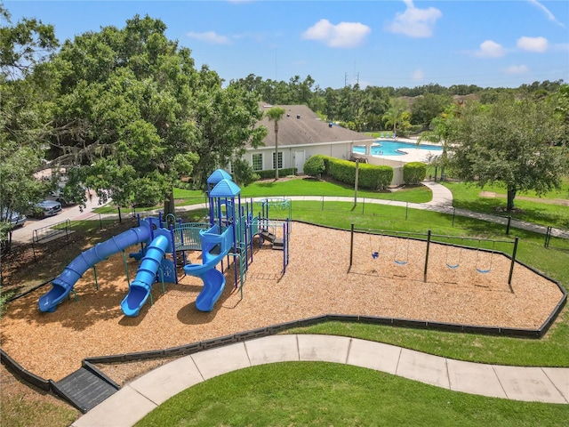 17668 Bright Wheat Dr, Lithia, FL 33547 - community playground with a yard