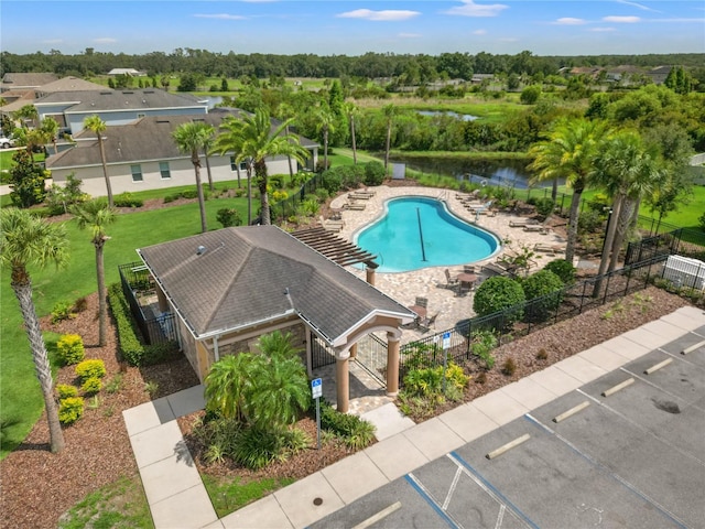 17668 Bright Wheat Dr, Lithia, FL 33547 - aerial view of a large body of water, a pool area, and a tree filled landscape
