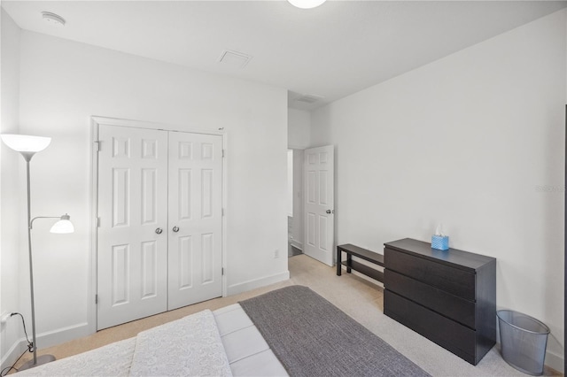 17668 Bright Wheat Dr, Lithia, FL 33547 - carpeted bedroom featuring a closet and baseboards