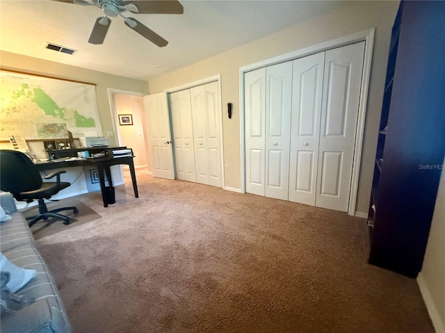 13133 Roseanna Dr, Spring Hill, FL 34609 - home office with a ceiling fan, carpet flooring, and baseboards