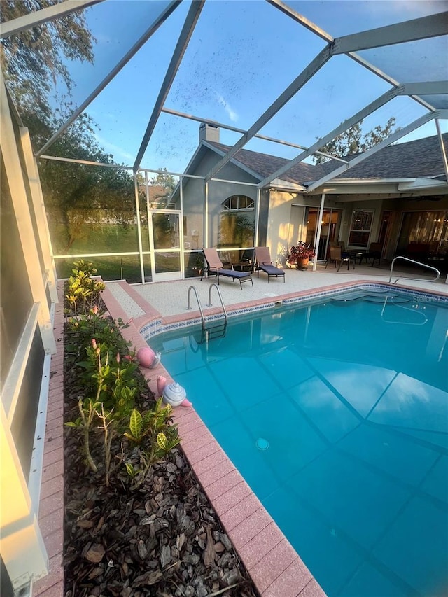 13133 Roseanna Dr, Spring Hill, FL 34609 - outdoor pool featuring a patio area and glass enclosure