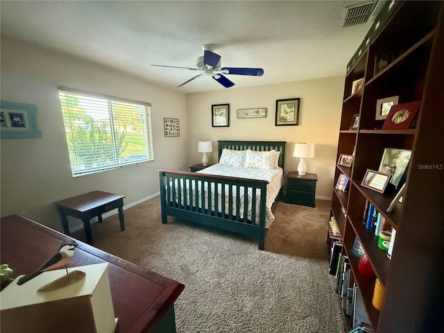 13133 Roseanna Dr, Spring Hill, FL 34609 - bedroom with carpet flooring, baseboards, and ceiling fan