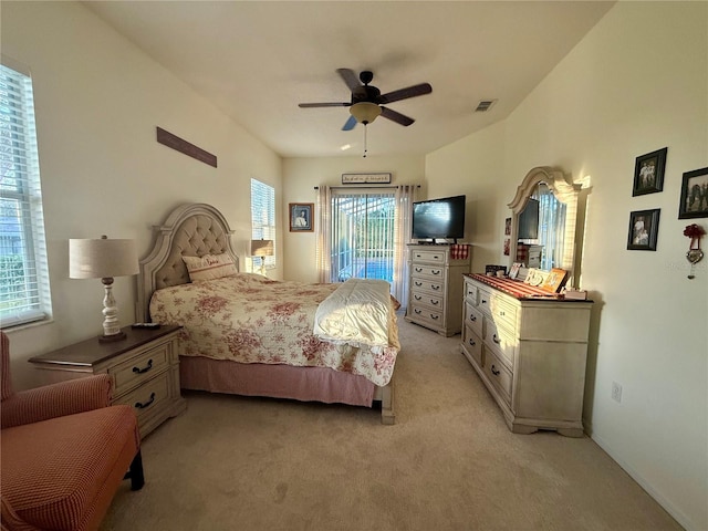 13133 Roseanna Dr, Spring Hill, FL 34609 - bedroom featuring access to outside, light colored carpet, and ceiling fan