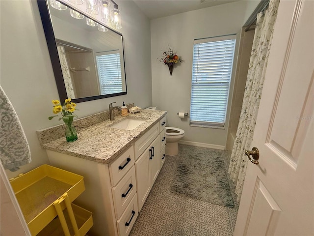 13133 Roseanna Dr, Spring Hill, FL 34609 - full bathroom with vanity, toilet, a shower with curtain, and plenty of natural light