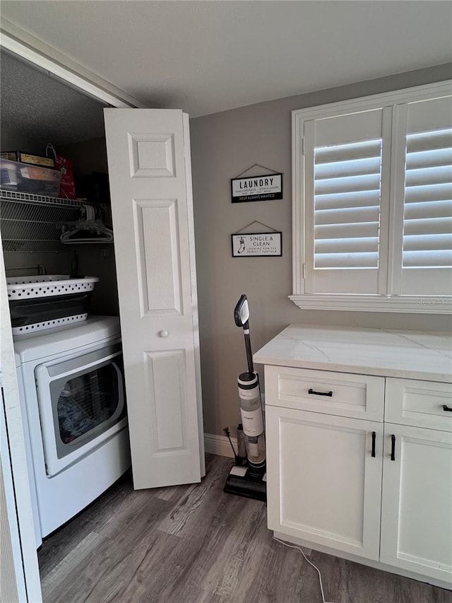 30 Tads Trl, Oldsmar, FL 34677 - laundry room with washer / dryer, wood finished floors, and baseboards