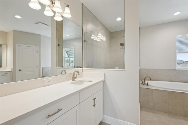 10320 Longmeadow Ave, Parrish, FL 34219 - bathroom with vanity, a bath, recessed lighting, a walk in shower, and tile patterned flooring