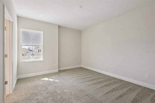 10320 Longmeadow Ave, Parrish, FL 34219 - spare room with carpet floors and baseboards