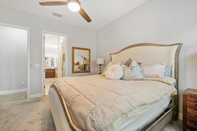 610 Winterside Dr, Apollo Beach, FL 33572 - bedroom with carpet floors, baseboards, ceiling fan, and ensuite bathroom