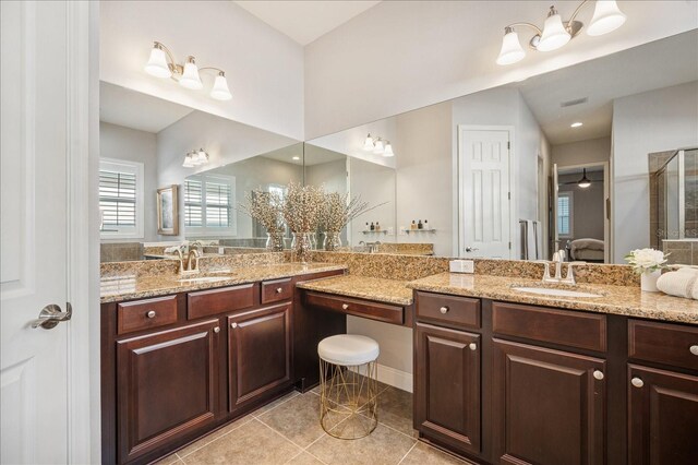610 Winterside Dr, Apollo Beach, FL 33572 - bathroom featuring tile patterned flooring, ensuite bathroom, vanity, and a shower