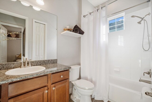 610 Winterside Dr, Apollo Beach, FL 33572 - full bath with shower / bath combo with shower curtain, vanity, and toilet