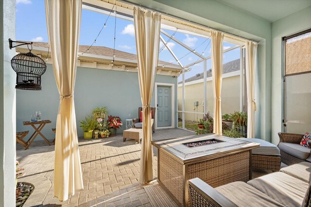 610 Winterside Dr, Apollo Beach, FL 33572 - sunroom / solarium with an outdoor living space with a fire pit