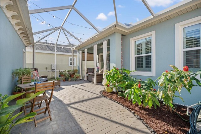 610 Winterside Dr, Apollo Beach, FL 33572 - view of patio / terrace with a lanai and outdoor dining area