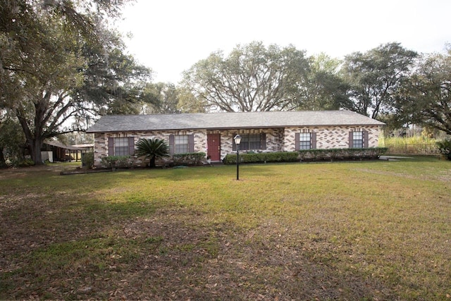 3705 Bruton, Plant City, FL 33565 - ranch-style home with a front yard