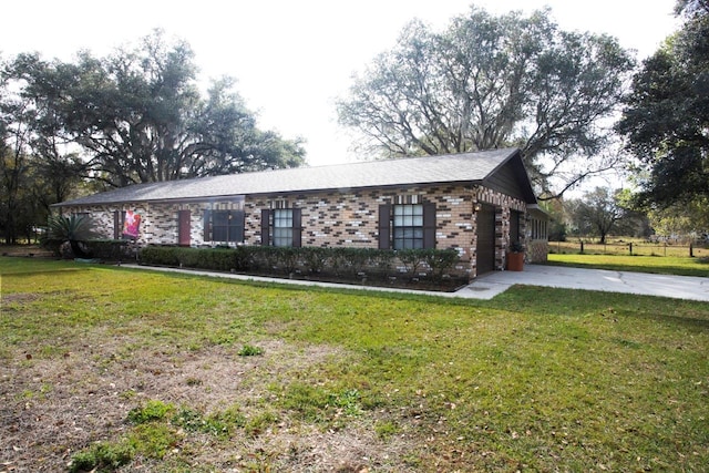 3705 Bruton, Plant City, FL 33565 - view of front of house with concrete driveway, a front lawn, brick siding, and a garage
