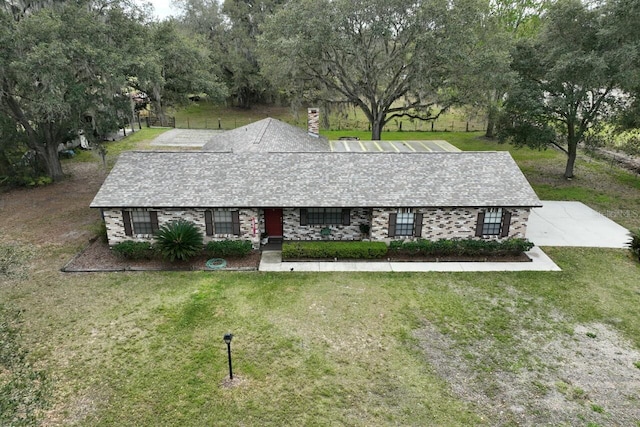 3705 Bruton, Plant City, FL 33565 - view of front of home with a front yard and a chimney