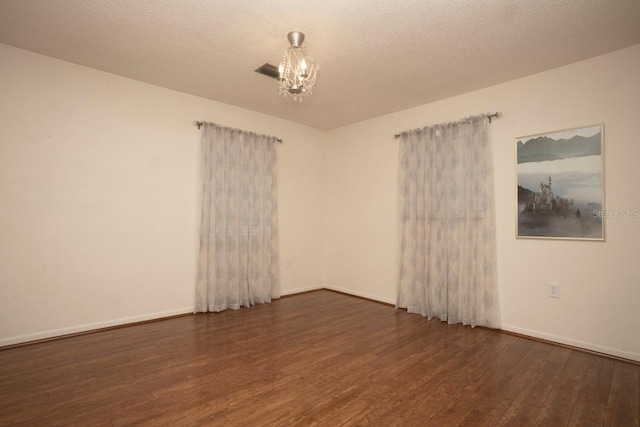 3705 Bruton, Plant City, FL 33565 - spare room featuring wood finished floors and baseboards
