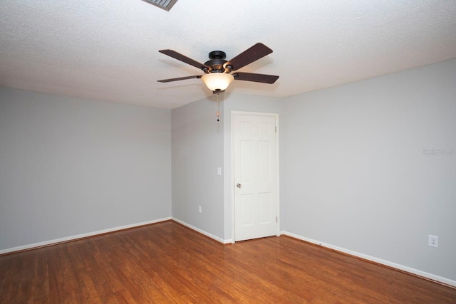 3705 Bruton, Plant City, FL 33565 - spare room featuring wood finished floors, ceiling fan, and baseboards