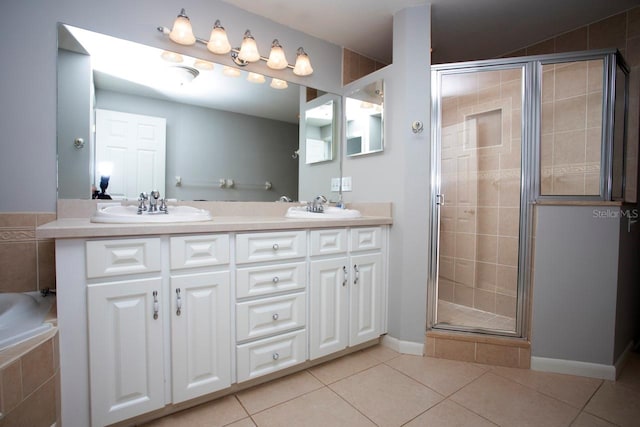 3705 Bruton, Plant City, FL 33565 - bathroom with tile patterned floors, double vanity, a stall shower, and a bath