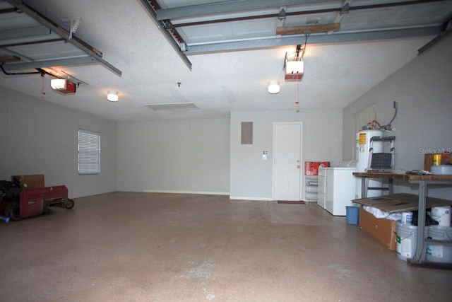 3705 Bruton, Plant City, FL 33565 - garage featuring washing machine and dryer, a garage door opener, water heater, and electric panel