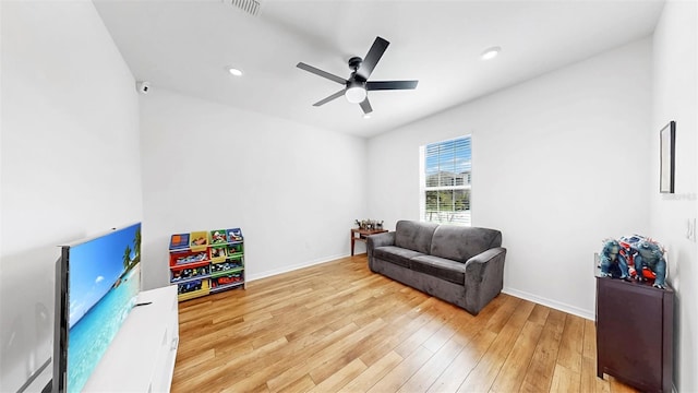9293 Rally Spring Loop, Wesley Chapel, FL 33545 - sitting room featuring light wood-style floors, a ceiling fan, baseboards, and recessed lighting