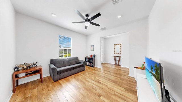 9293 Rally Spring Loop, Wesley Chapel, FL 33545 - living area with ceiling fan, light wood-style floors, baseboards, and recessed lighting