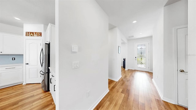 9293 Rally Spring Loop, Wesley Chapel, FL 33545 - hall featuring light wood-style flooring, recessed lighting, and baseboards