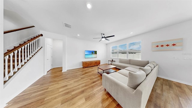 9293 Rally Spring Loop, Wesley Chapel, FL 33545 - living room with ceiling fan, light wood-style flooring, stairway, baseboards, and recessed lighting