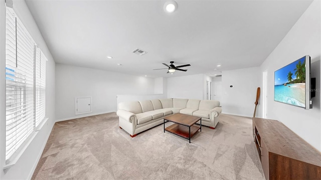 9293 Rally Spring Loop, Wesley Chapel, FL 33545 - living room with light carpet, recessed lighting, a ceiling fan, and baseboards
