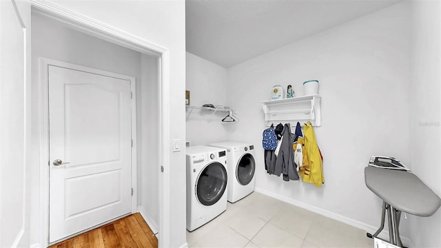 9293 Rally Spring Loop, Wesley Chapel, FL 33545 - laundry room with separate washer and dryer and baseboards