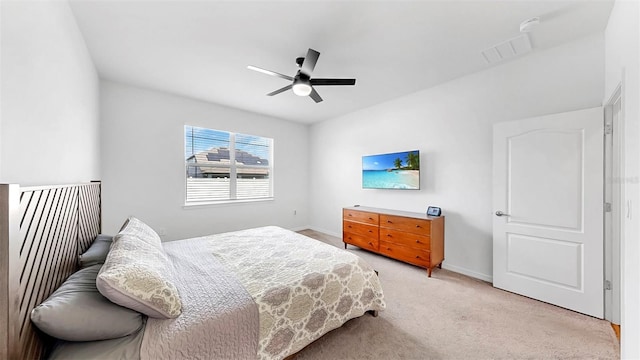 9293 Rally Spring Loop, Wesley Chapel, FL 33545 - carpeted bedroom with baseboards and a ceiling fan