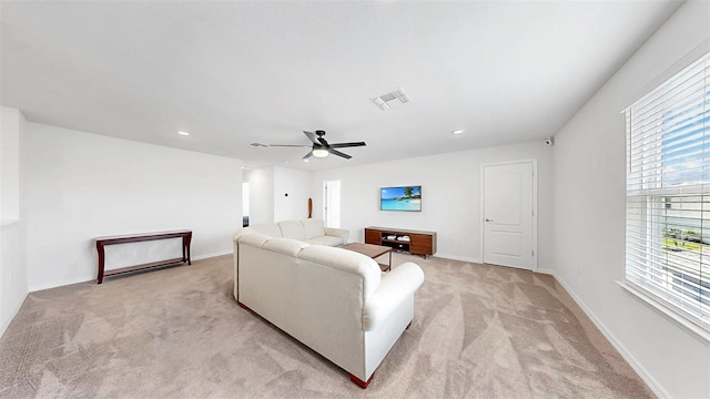 9293 Rally Spring Loop, Wesley Chapel, FL 33545 - living area featuring light carpet, ceiling fan, recessed lighting, and baseboards