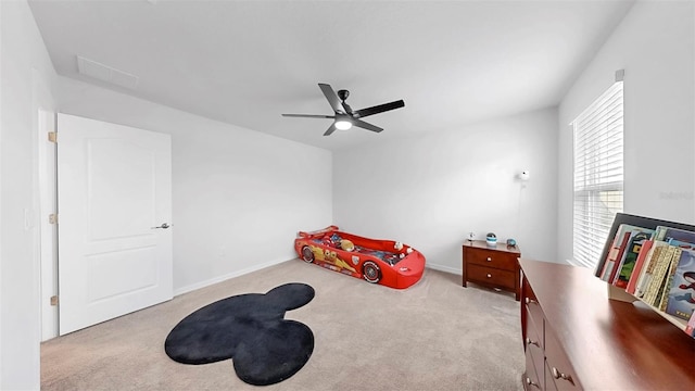 9293 Rally Spring Loop, Wesley Chapel, FL 33545 - carpeted bedroom with ceiling fan and baseboards
