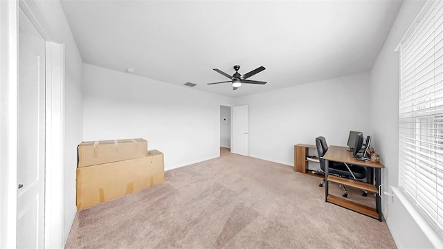 9293 Rally Spring Loop, Wesley Chapel, FL 33545 - carpeted home office with a ceiling fan, plenty of natural light, and baseboards