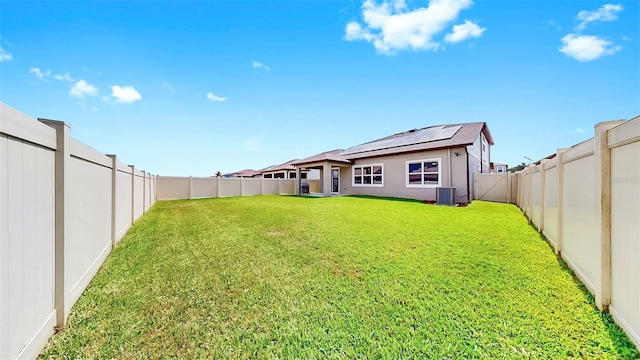 9293 Rally Spring Loop, Wesley Chapel, FL 33545 - rear view of property featuring central air condition unit