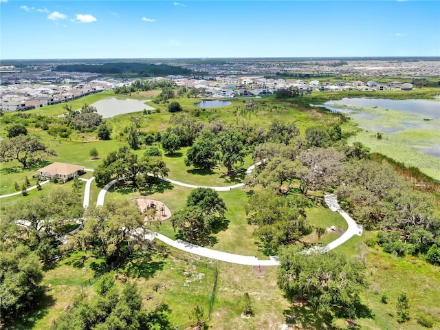 9293 Rally Spring Loop, Wesley Chapel, FL 33545 - aerial view of property's location with a nearby body of water and nearby suburban area