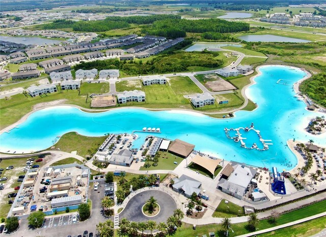 9293 Rally Spring Loop, Wesley Chapel, FL 33545 - drone / aerial view of a large body of water and a pool area