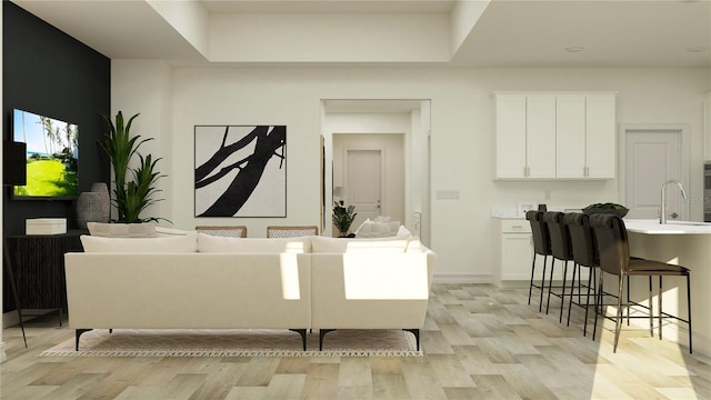 7541 E 116th St, Palmetto, FL 34221 - living area featuring light wood-type flooring and baseboards