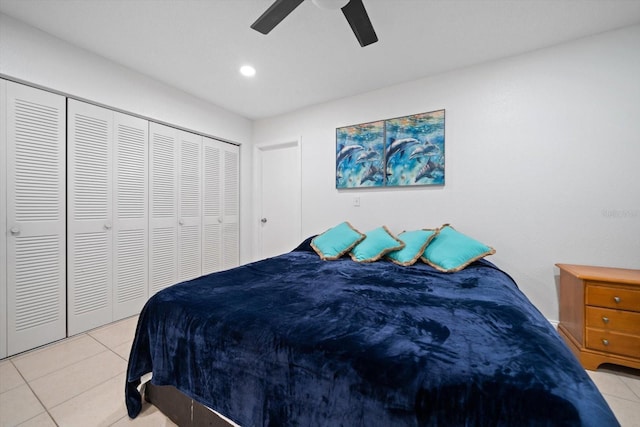 10038 62nd Ter N Unit 17, Saint Petersburg, FL 33708 - bedroom with light tile patterned flooring, recessed lighting, a ceiling fan, and a closet