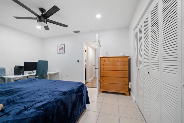 10038 62nd Ter N Unit 17, Saint Petersburg, FL 33708 - bedroom featuring recessed lighting, light tile patterned flooring, baseboards, a closet, and a ceiling fan