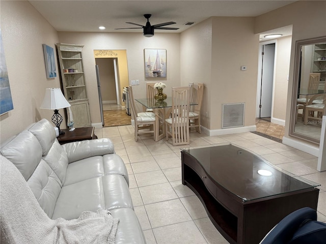 10038 62nd Ter N Unit 17, Saint Petersburg, FL 33708 - living area featuring a ceiling fan, light tile patterned floors, baseboards, and recessed lighting